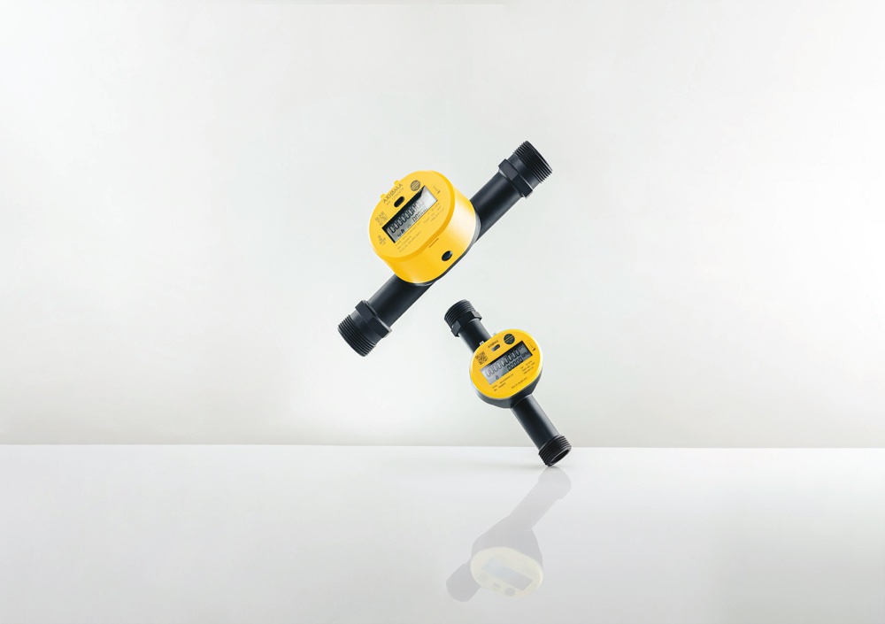 Axioma Qalcosonic W1 ultrasonic water meters with yellow displays